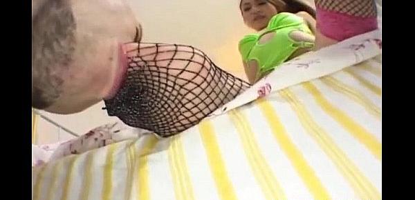 Saori in green lingerie rubs penis with feet